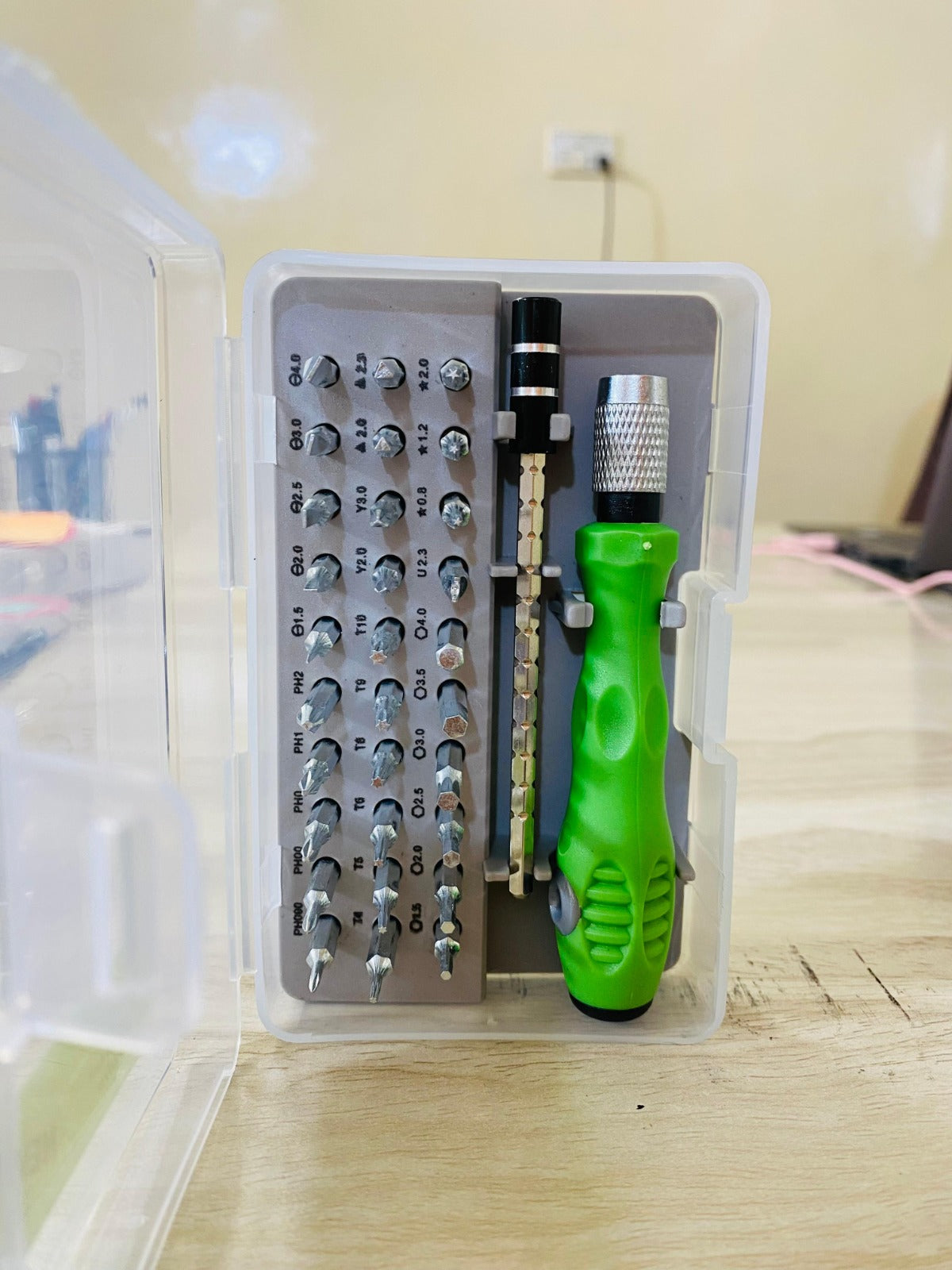 32-in-1 precision screwdriver set with magnetic bits for electronics, watches, laptops, and home repair tasks.