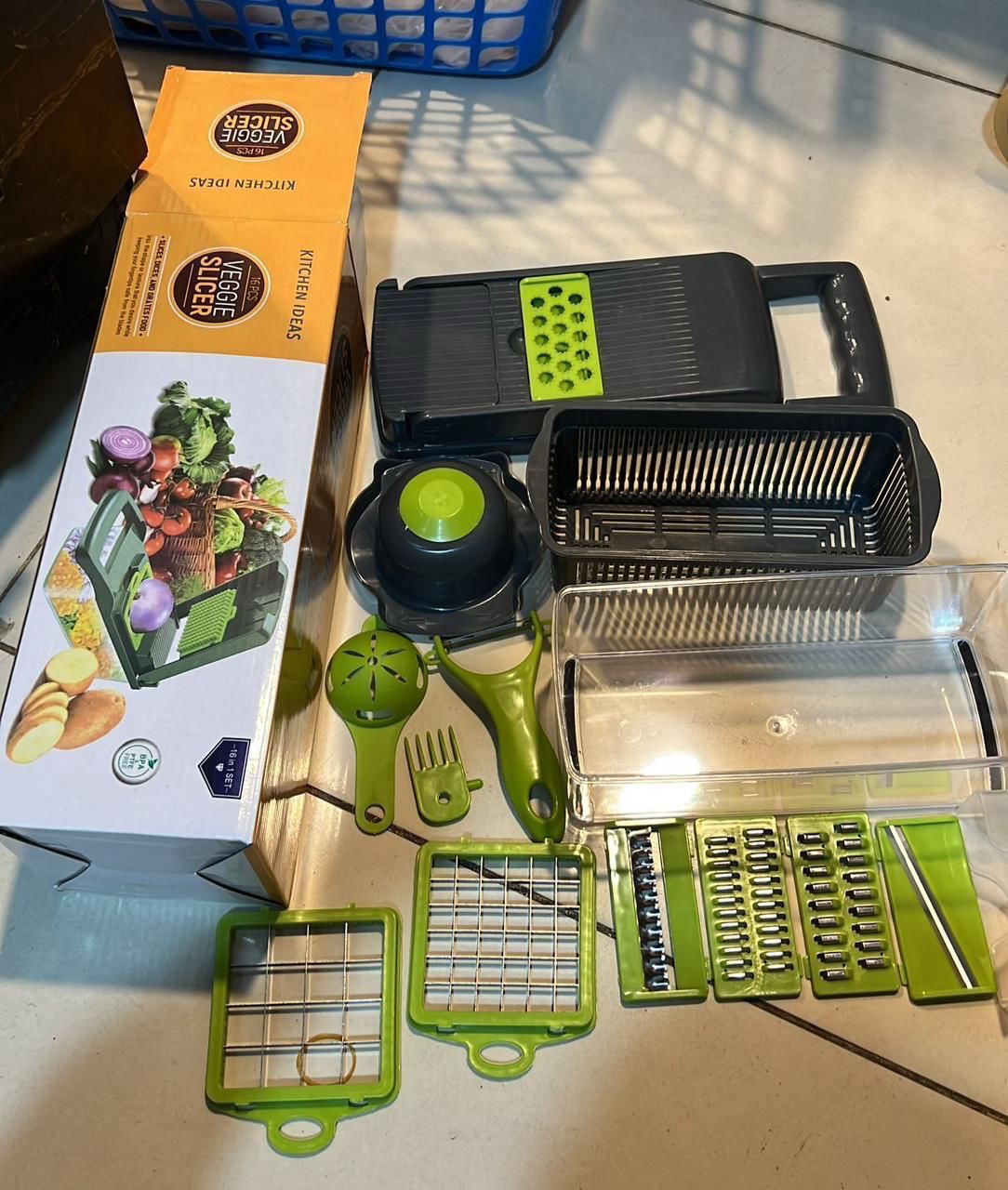 16-in-1 Multifunction Vegetable Chopper Ð sharp stainless steel blades, colander, and storage container for easy food prep
