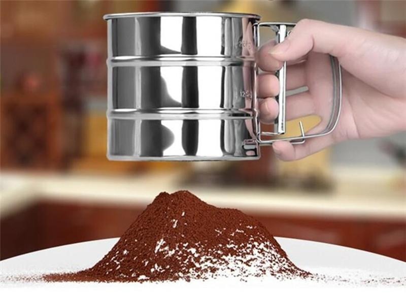Stainless steel flour sifter with double-layer mesh and one-hand press for smooth, lump-free baking every time