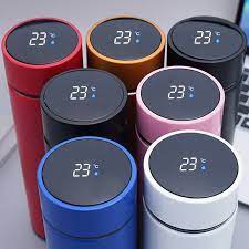 Smart stainless steel water bottle with LED temperature display, vacuum insulated for hot and cold drinks, portable durable.