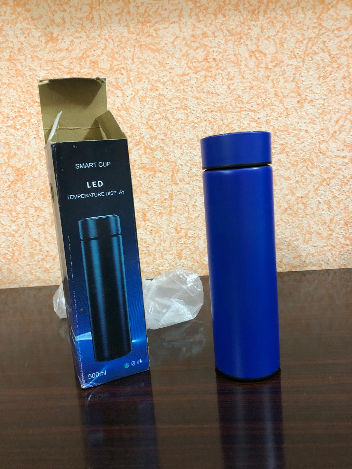 Smart stainless steel water bottle with LED temperature display, vacuum insulated for hot and cold drinks, portable durable.