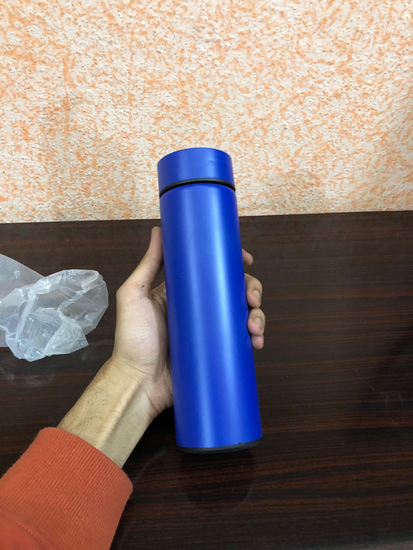 Smart stainless steel water bottle with LED temperature display, vacuum insulated for hot and cold drinks, portable durable.
