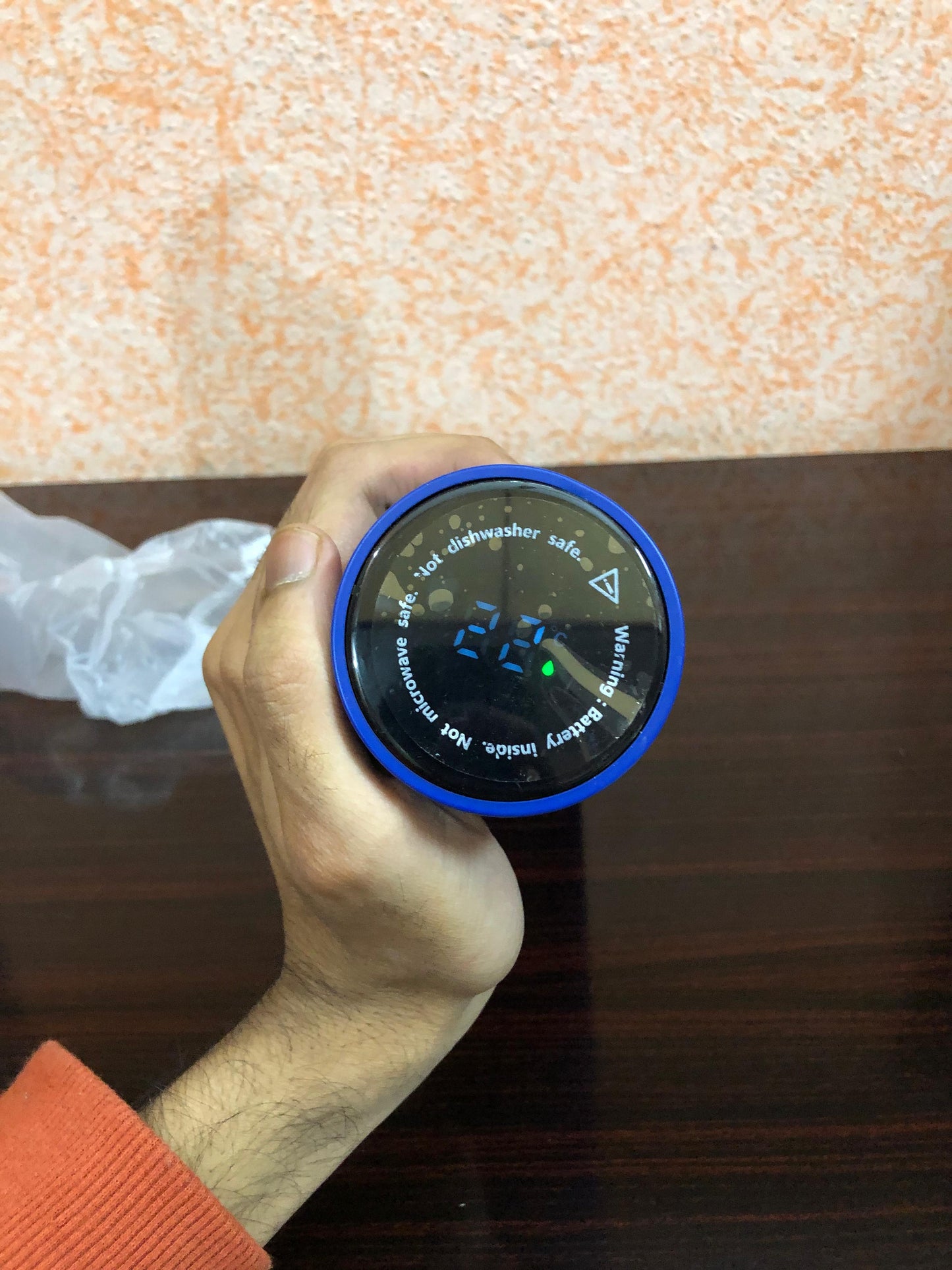 Smart stainless steel water bottle with LED temperature display, vacuum insulated for hot and cold drinks, portable durable.